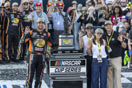 Chase Briscoe (L) in victory lane at the YellaWood 500 at Talladega Superspeedway. Source: Imagn